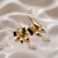 Golden Bow Pearl Drop Earrings