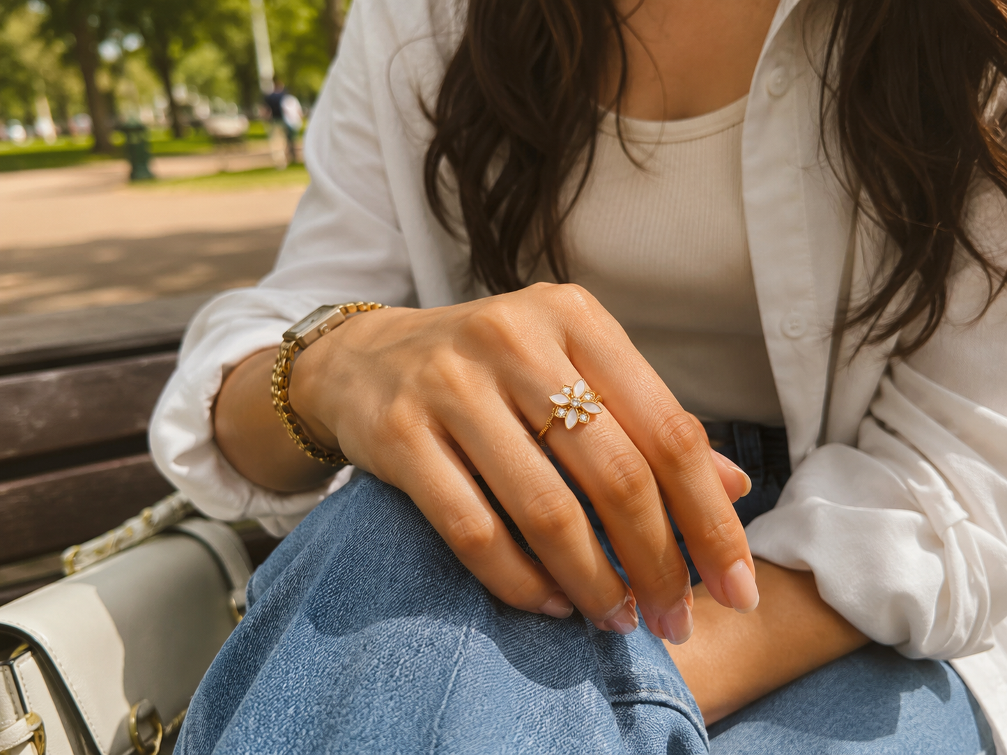 Elegant gold floral adjustable ring featuring ivory petals and sparkling crystal accents, perfect for daily wear, gifting, and festive occasions."